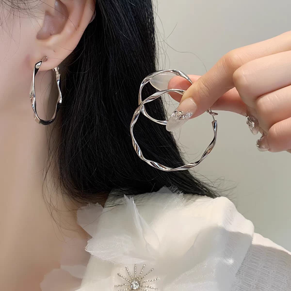 Aretes de aro Möbius de plata esterlina 999