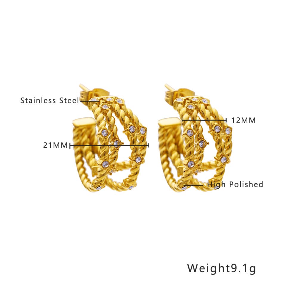 Aretes de acero titanio con baño de oro 18K y diamante