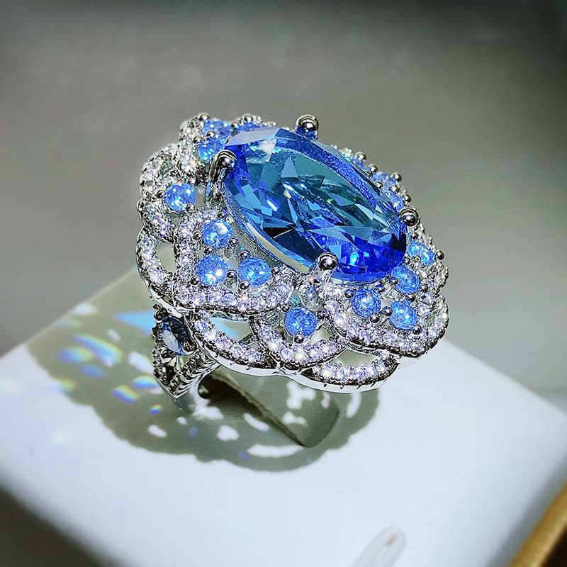 Anillo abierto con topacio azul marino para mujer