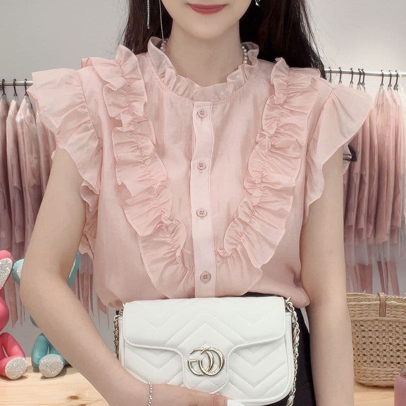 Blusa chiffon sin mangas con volantes