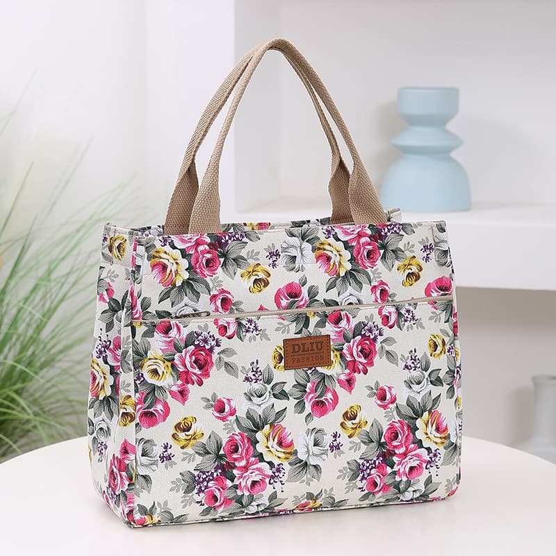 Bolsa de mano étnica con gran capacidad y diseño floral