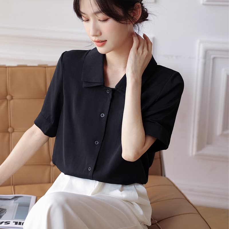 Camisa elegante con cuello de solapa, diseño exclusivo