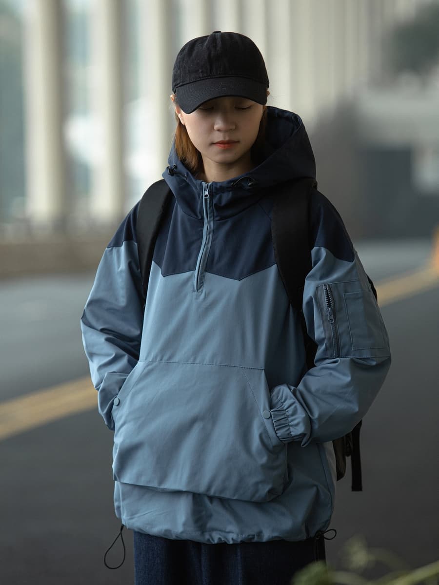 Sudadera con capucha y combinación de colores unisex