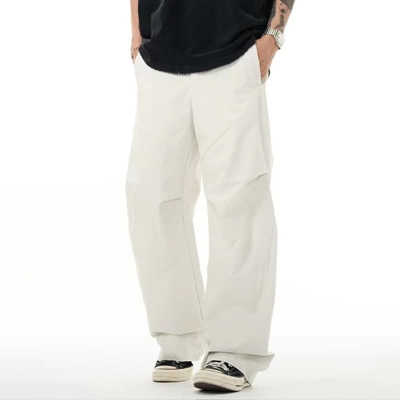 Pantalones casuales blancos con pliegues