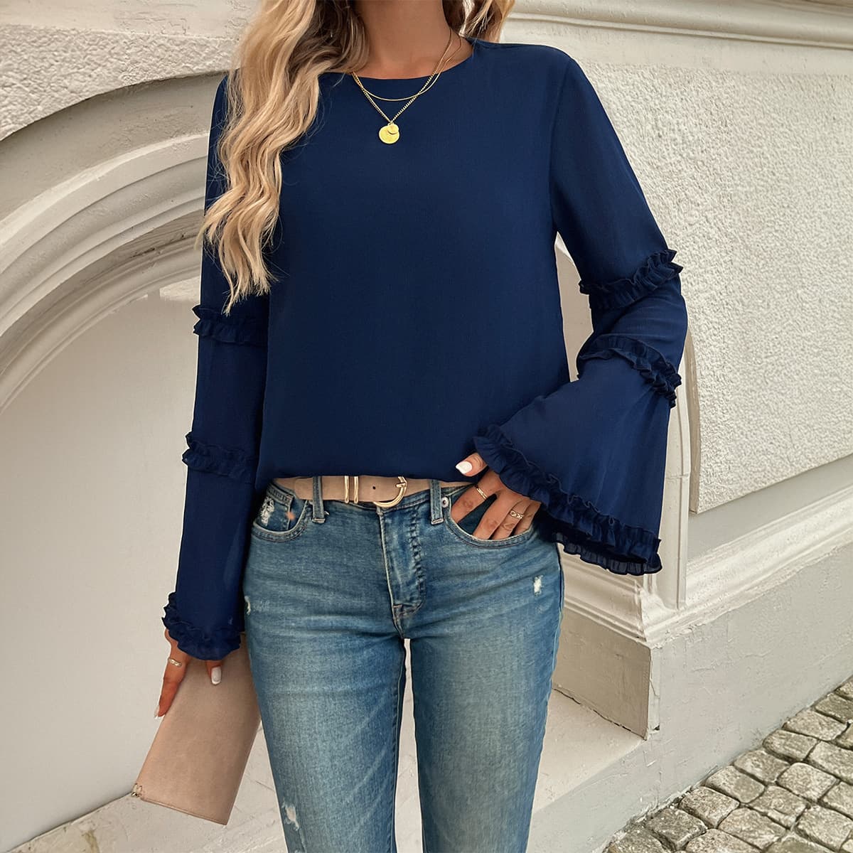 Blusa larga suelta con manga acampanada
