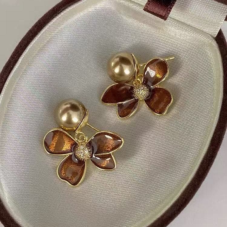 Aretes de flor vintage esmaltados con perlas ámbar