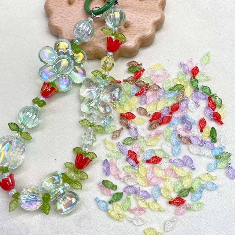 Cuentas acrílicas pequeñas en forma de hoja para joyería