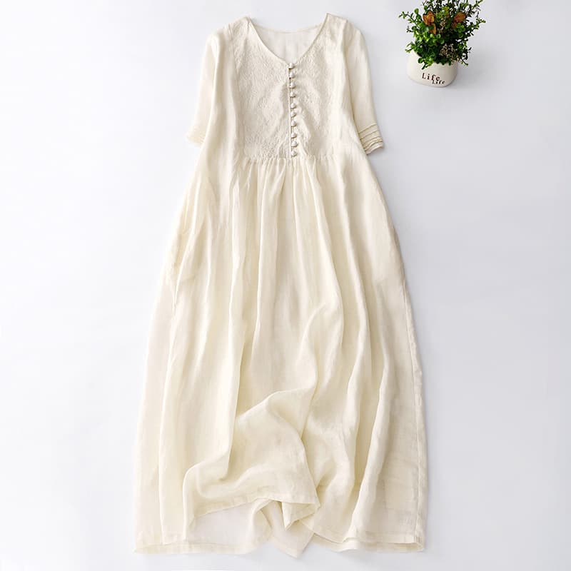 Vestido de algodón y lino con bordado, cuello V y detalles retro