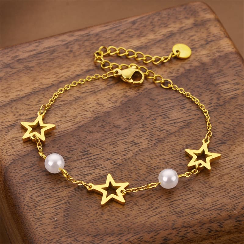 Pulsera de acero titanio con circonita y perla