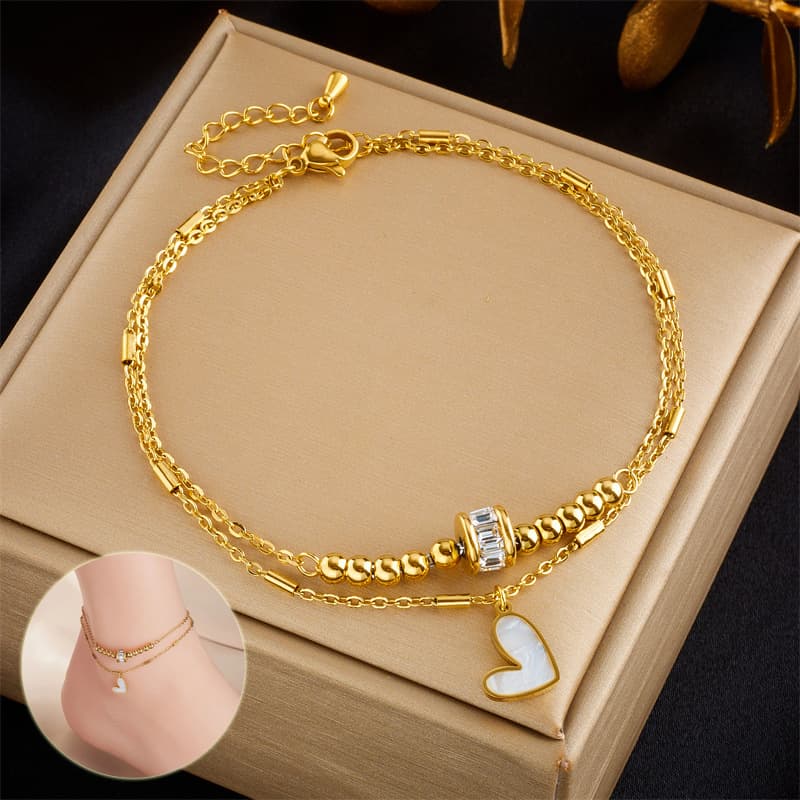 Pulsera tobillera dorada con diseño de corazón