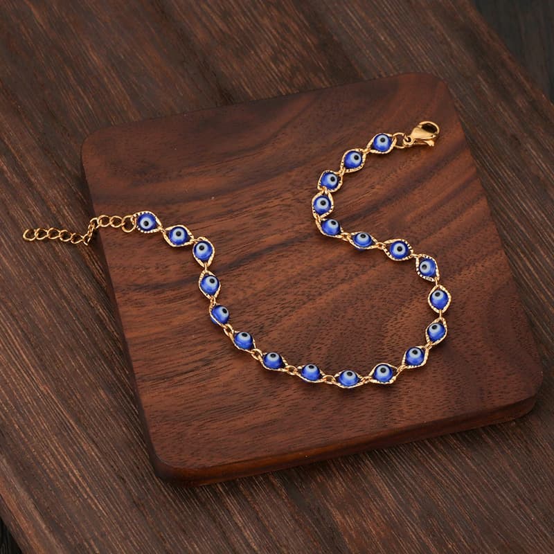 Brazalete ojo de Dios acero inoxidable y acrílico para mujeres