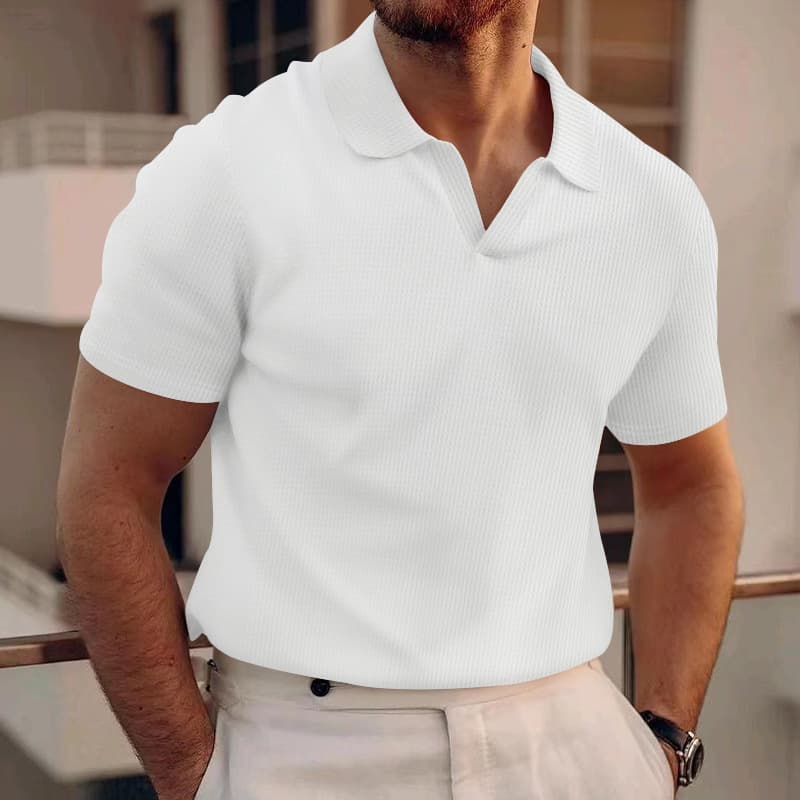 Polo slim fit piqué manga corta cuello V hombre