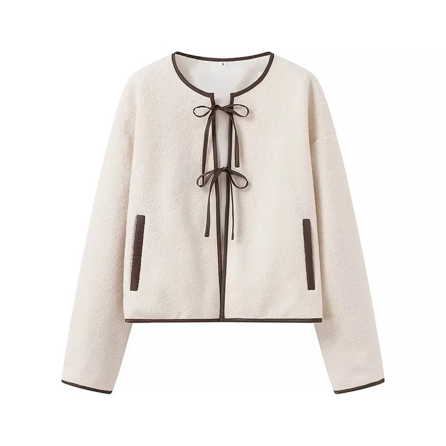 Blusa de cuello redondo con moño y amarre frontal