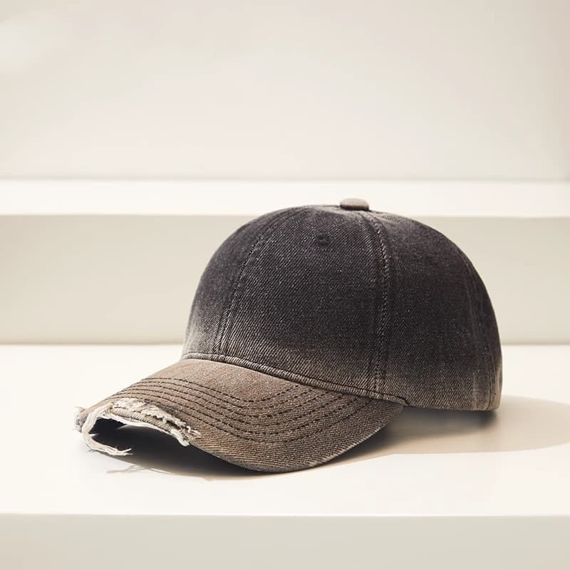 Gorra de béisbol jean desteñido con efecto degradado y roto