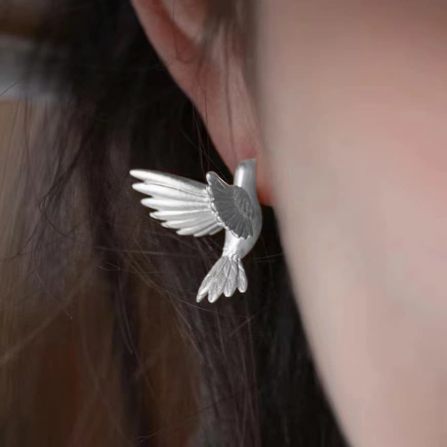 Aretes de botón con diseño de pájaro estilo retro
