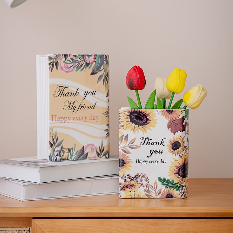 Jarrón de cerámica con diseño de libro para arreglos florales