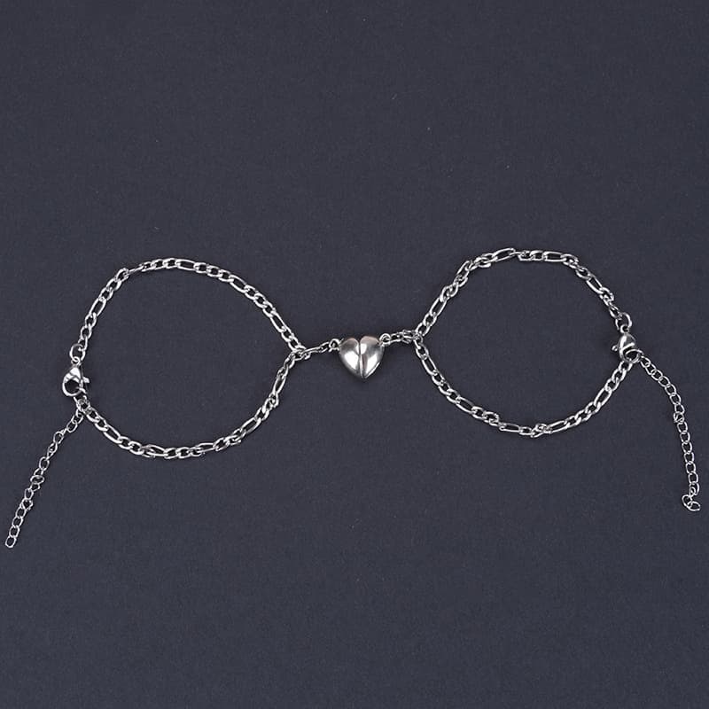 Pulsera de parejas con cierre de corazón de acero titanio