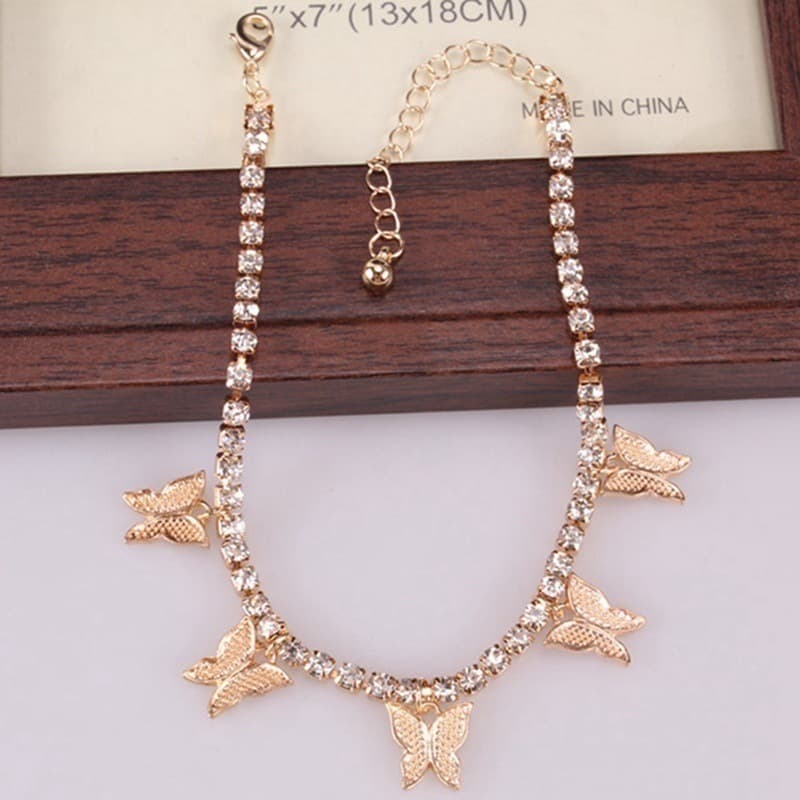 Tobillera con mariposa y borla elegante