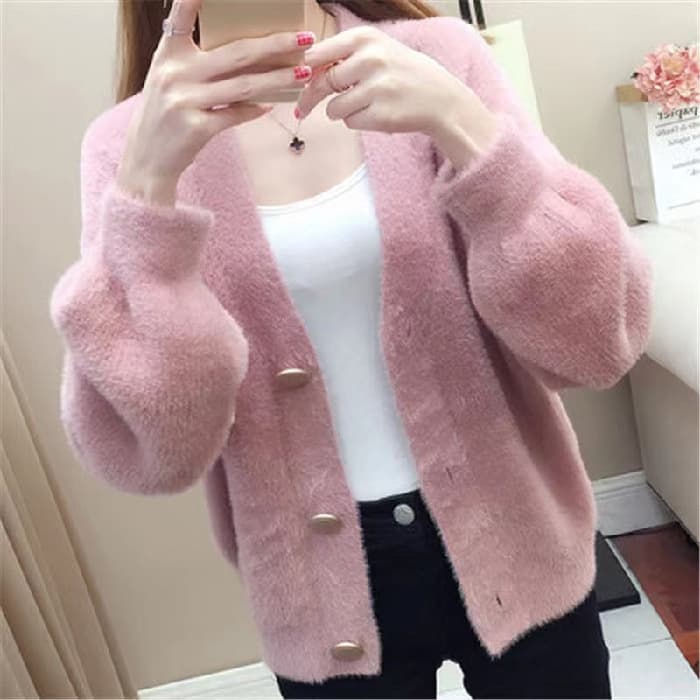 Prenda superior corta de punto holgada y fashionable