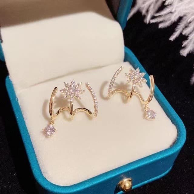 Aretes de zircones en forma de octagrama