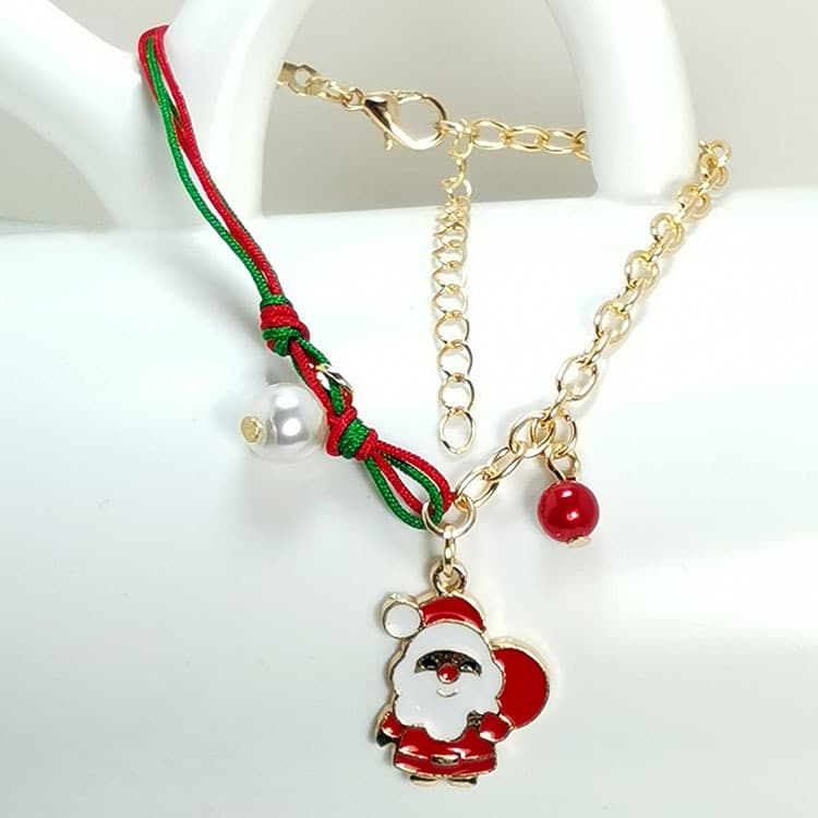 Pulsera de encanto navideño con muñeco y reno