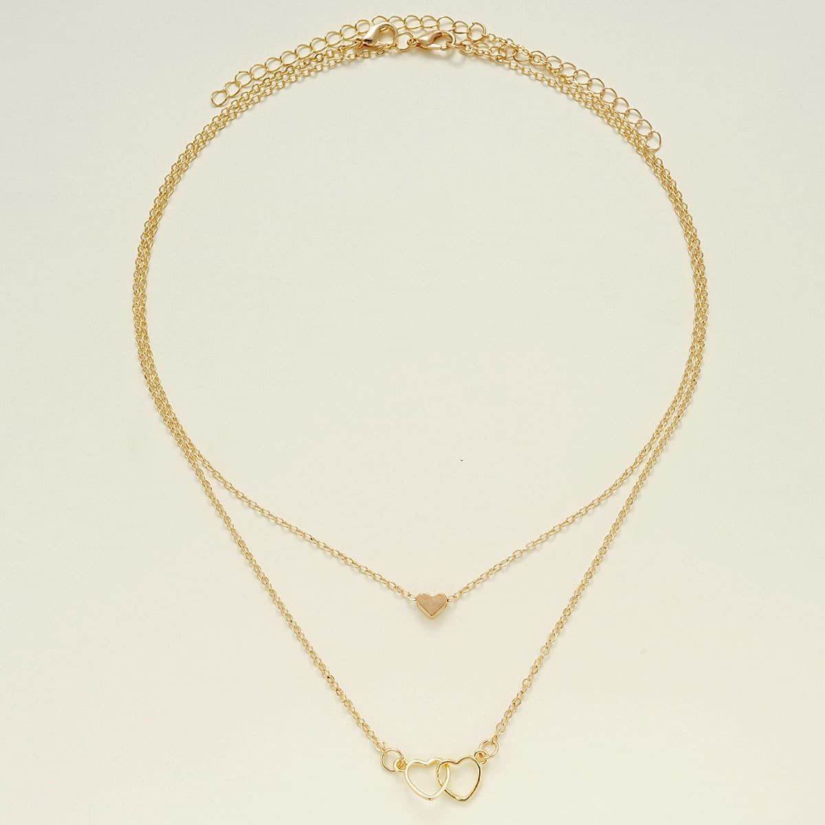 Collar doble capa con colgante de corazón hueco