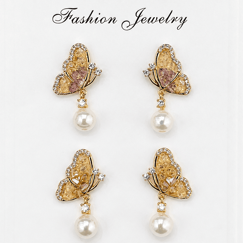 Aretes de perla con mariposa de cristal color