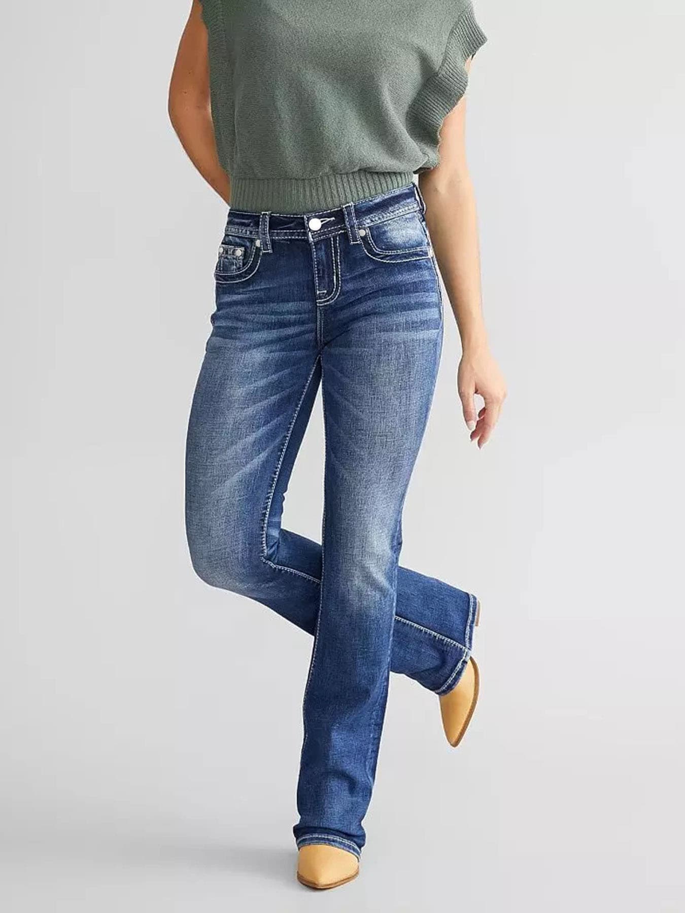 Pantalones acampanados de mezclilla con bordado