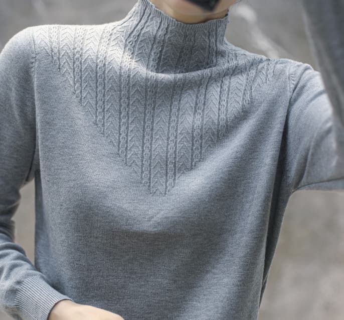 Suéter con encaje y cuello alto de manga larga