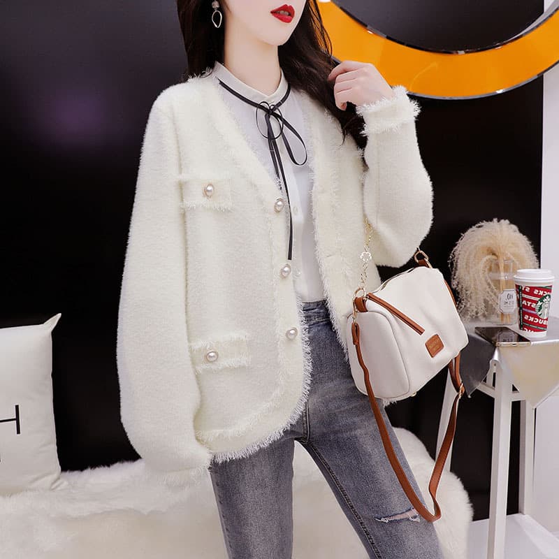 Cardigan vintage suelto con detalles de borlas