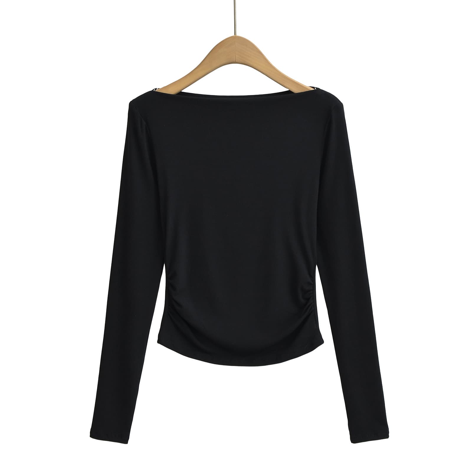 Blusa hombro descubierto con pliegues y manga larga