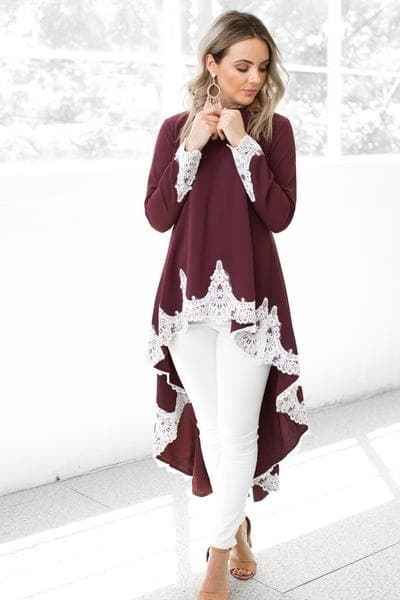 Vestido de manga larga con encaje y falda irregular