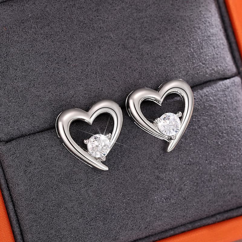 Aretes de corazón hueco con circones en cobre