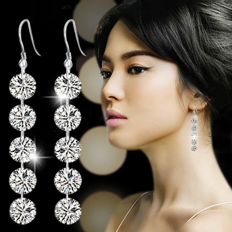 Aretes de diamantes con borla, diseño largo elegante