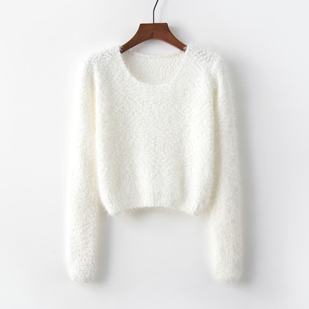 Suéter casual cuello redondo con broche piña