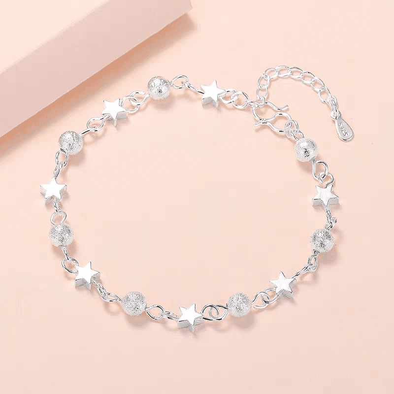Pulsera de plata 999 con estrella y perla mate