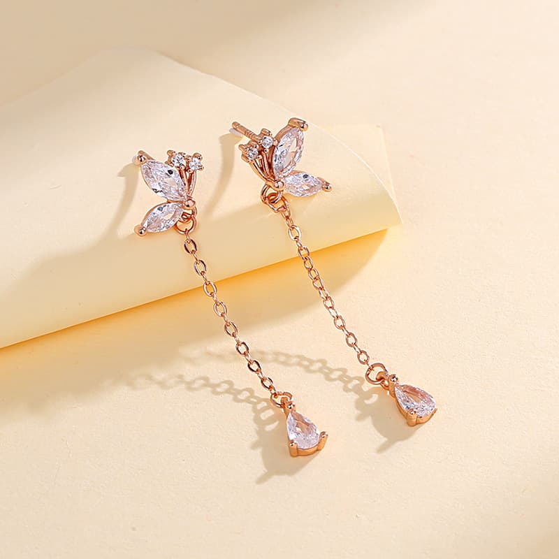 Aretes de mariposa con circonita y borla de plata