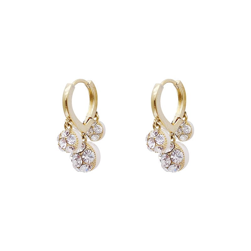 Aretes perla con diamantes diseño lujo minimalista