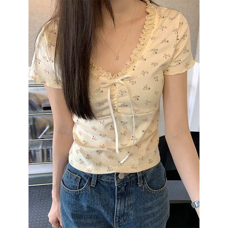 Blusa de algodón floral con cuello en V y encaje