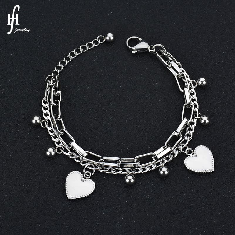 Pulsera de acero inoxidable con cadenas y dije de corazón