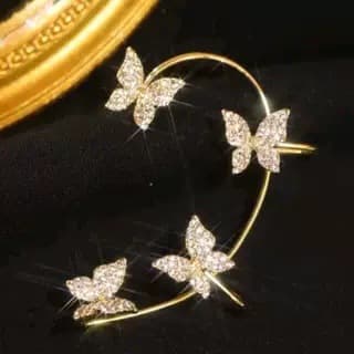 Aretes clip sin perforación con diseño de mariposa