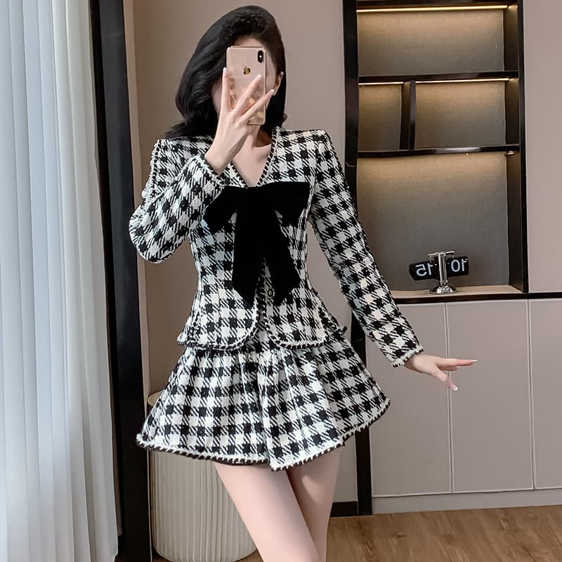 Conjunto de dos piezas con falda con volantes y blusa de manga larga