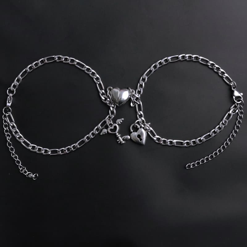 Juego de pulseras de pareja con diseño de corazón