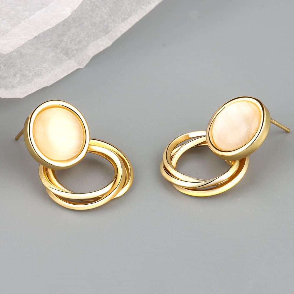 Aretes geométricos de cobre para mujer