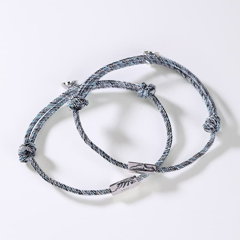 Pulsera de plata pura con hilo de colores