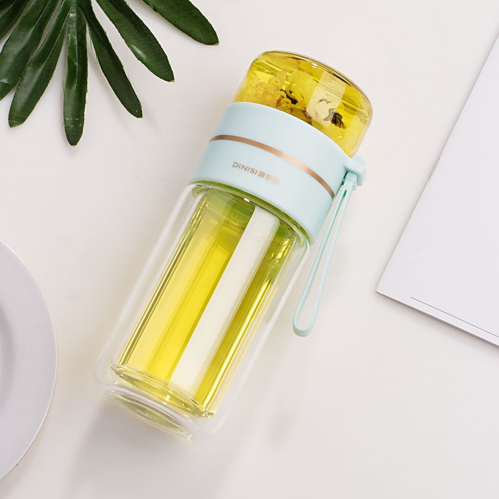 Botella de agua de vidrio con infusor de té y doble pared