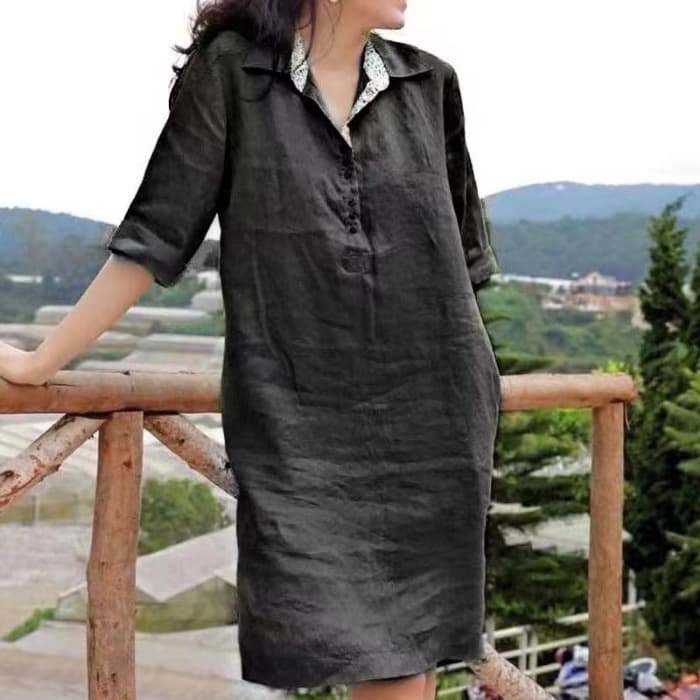 Vestido suelto con escote en V y largo medio