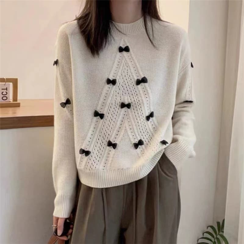 Suéter cuello redondo manga larga con detalle de moño