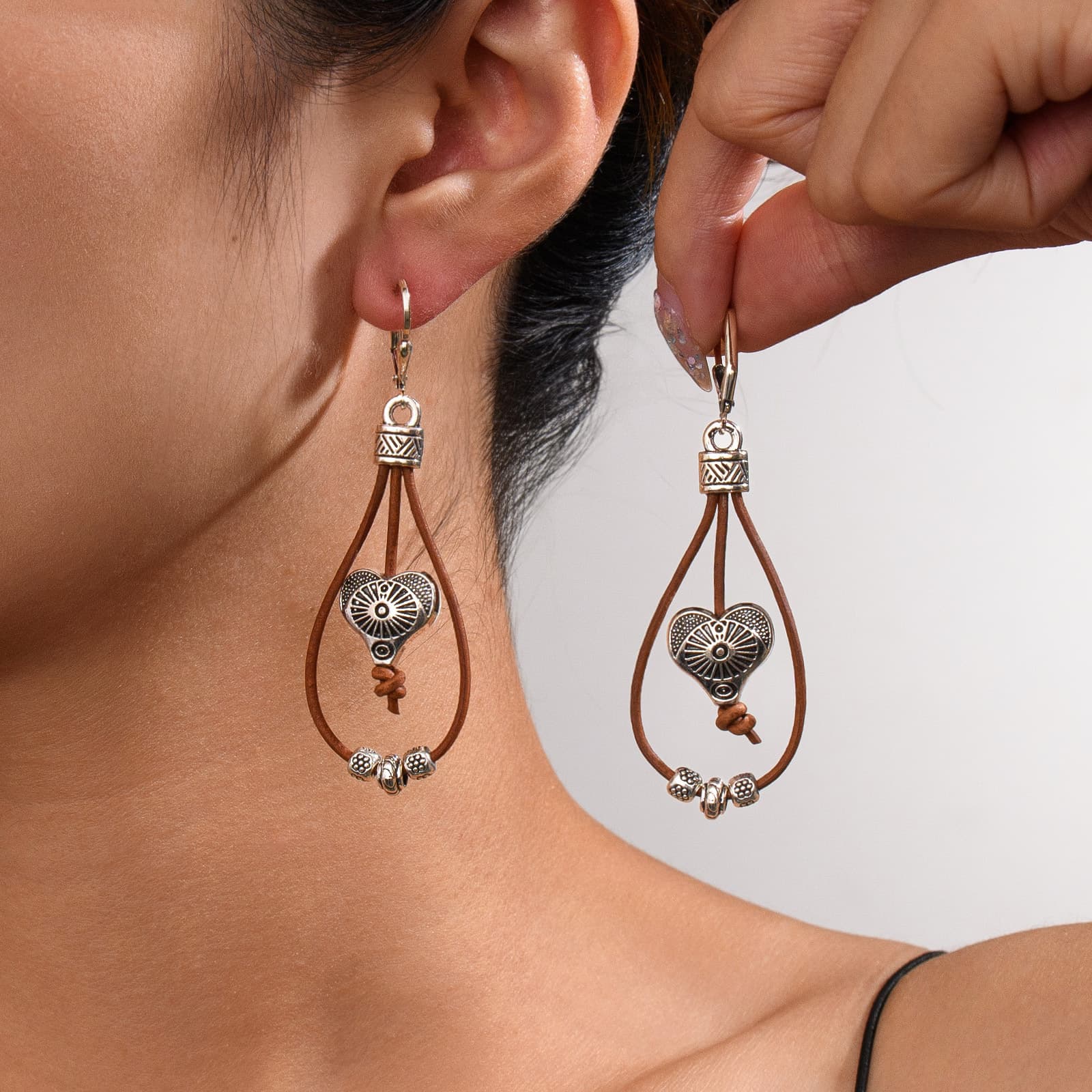 Aretes étnicos vintage con flores y turquesa