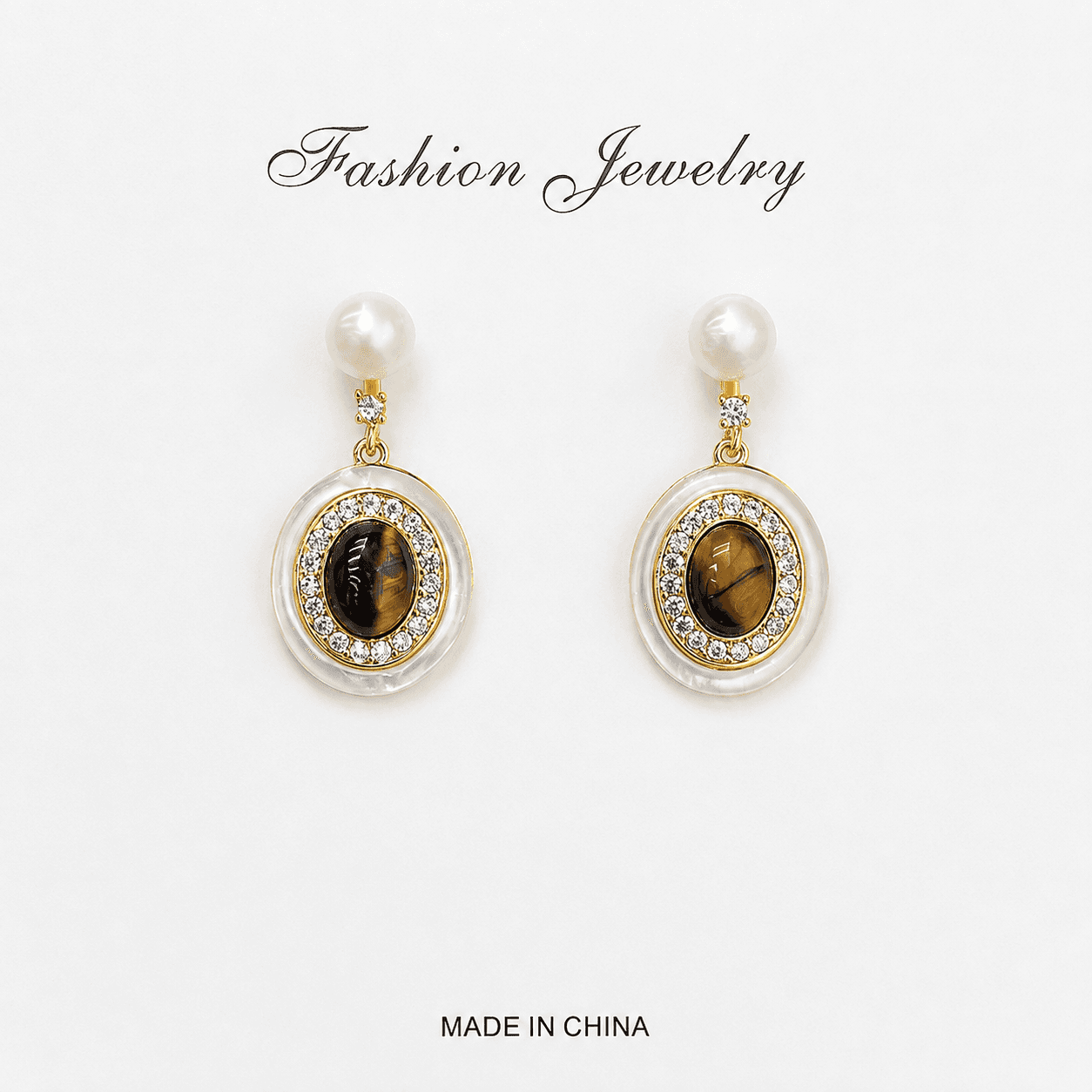 Aretes de perla con ojo de tigre y diamantes